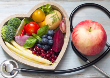 Healthy food in heart diet concept with stethoscope closeup